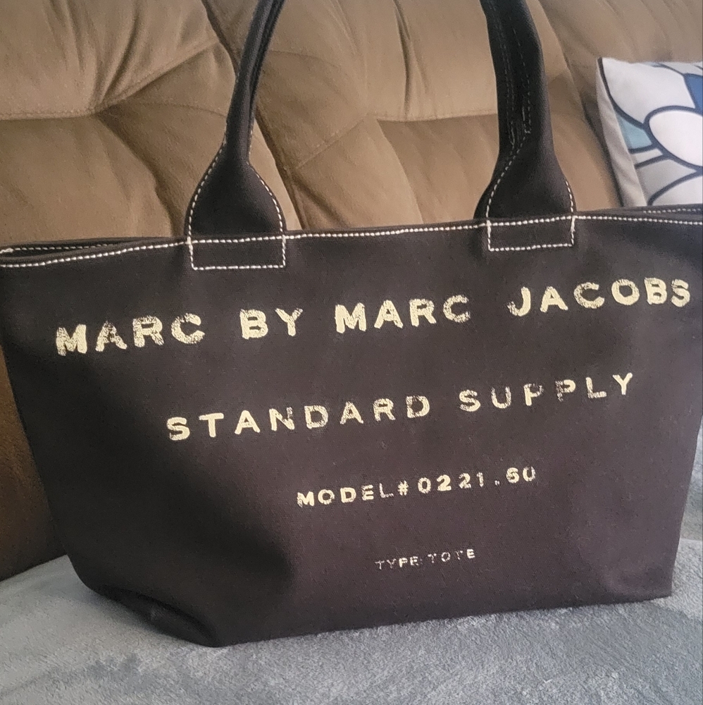 Marc by Marc Jacobs’s  canvas tote bag in black. Gently used, sturdy canvas.